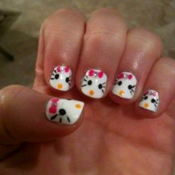 hello kitty nails with bow