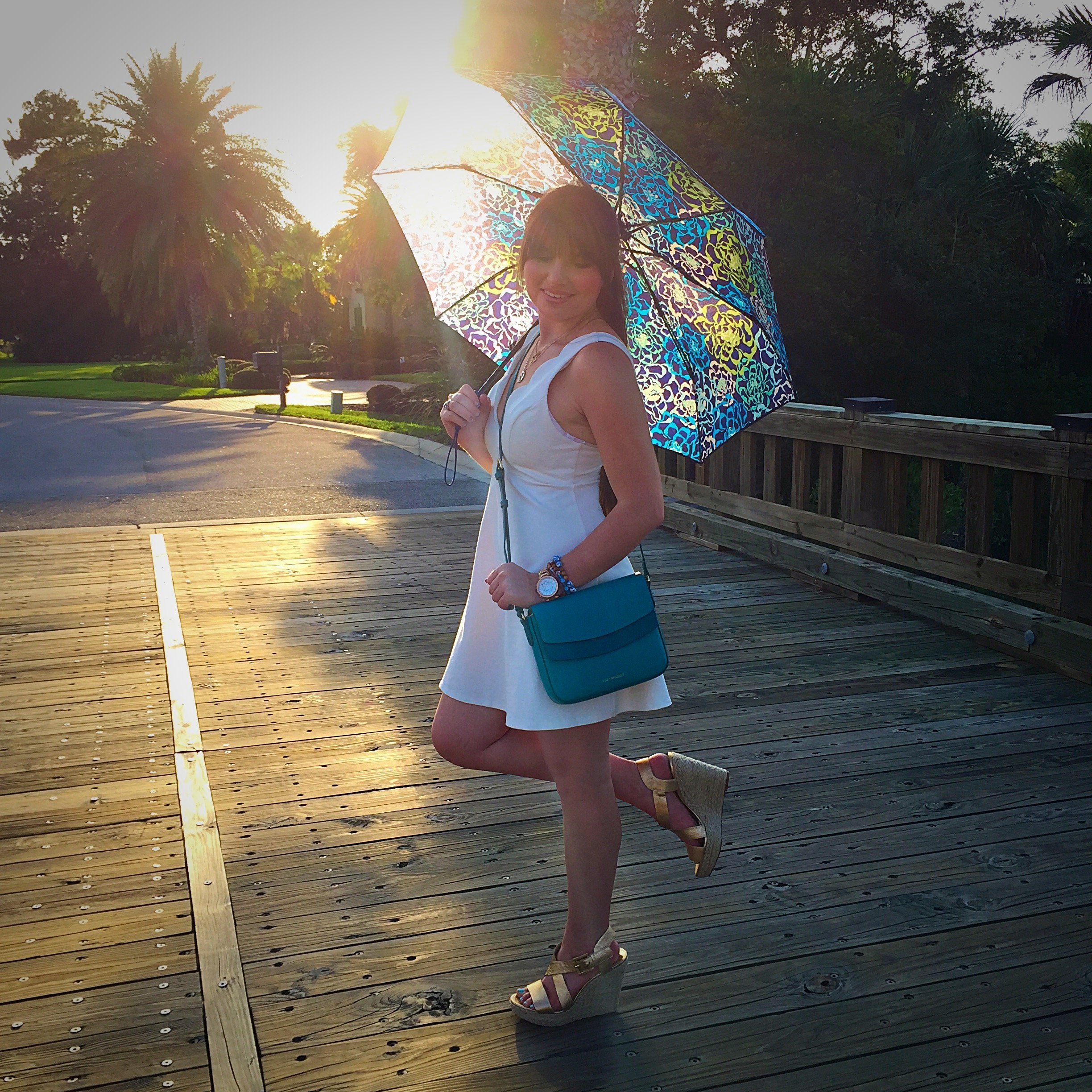 Dress: Original Piece Boutique Purse & Umbrella: Vera Bradley Shoes: Michael Kors